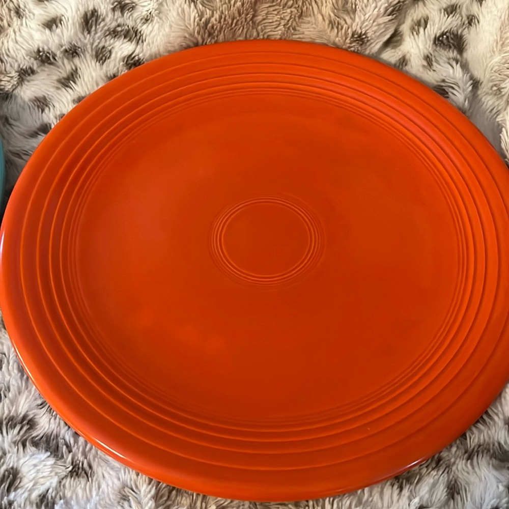 Vintage red fiesta chop plate.